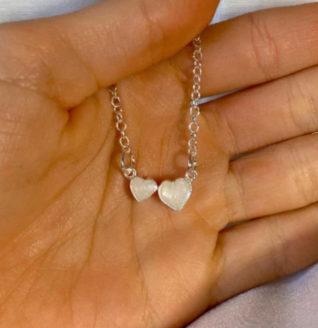 Cremation Necklace Metals: Silver vs. Gold vs. Stainless Steel vs. Titanium