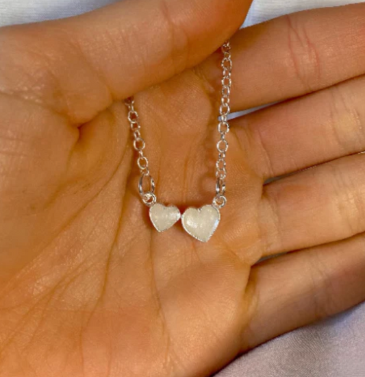 Cremation Necklace Metals: Silver vs. Gold vs. Stainless Steel vs. Titanium