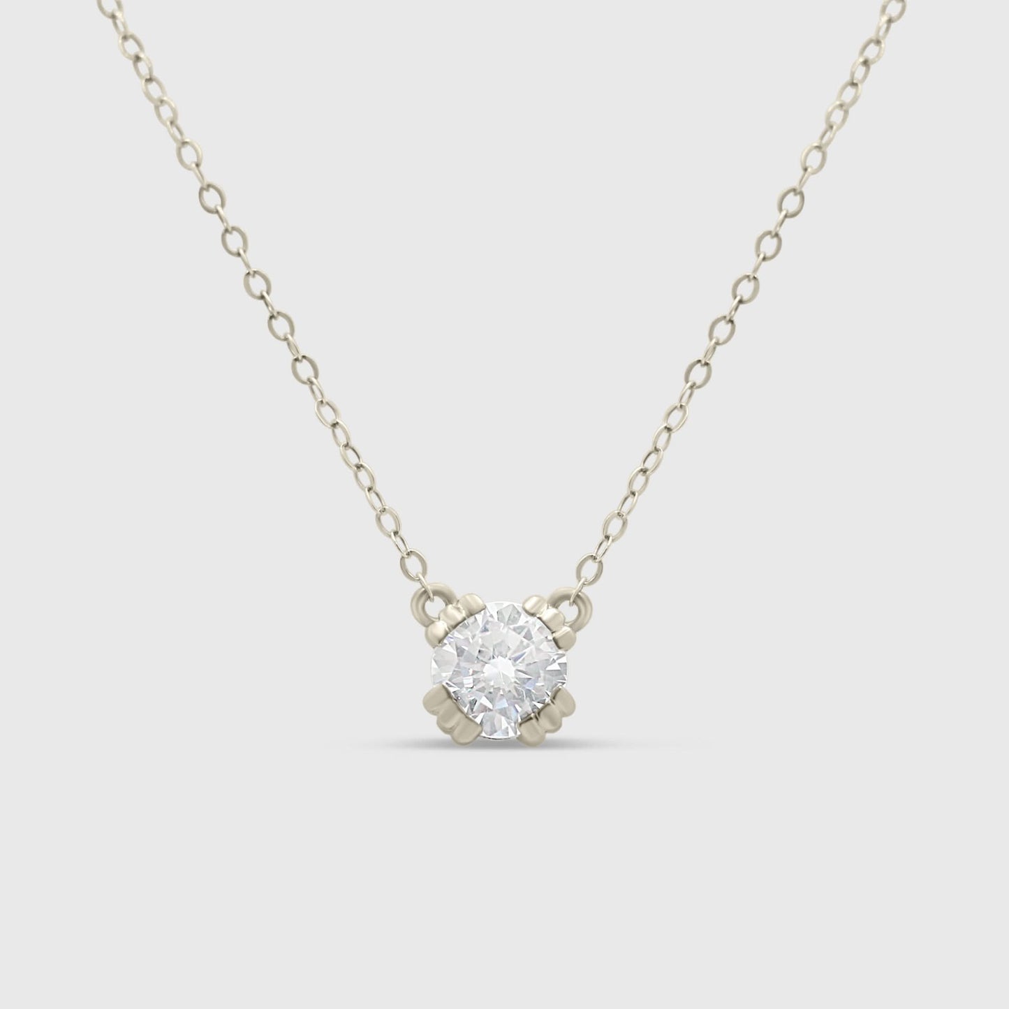 Elise Moissanite Necklace featuring a brilliant Moissanite stone set in an elegant silver pendant
