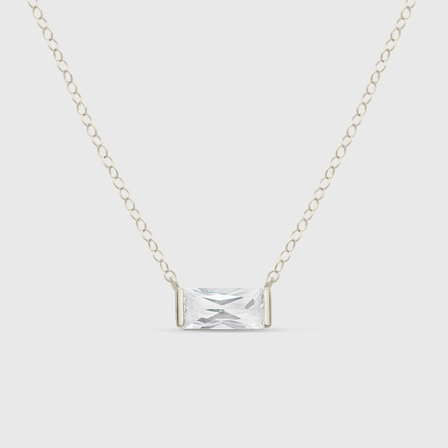 Mollie CZ Necklace featuring a sparkling cubic zirconia pendant on a delicate silver chain