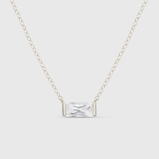 Mollie CZ Necklace featuring a sparkling cubic zirconia pendant on a delicate silver chain